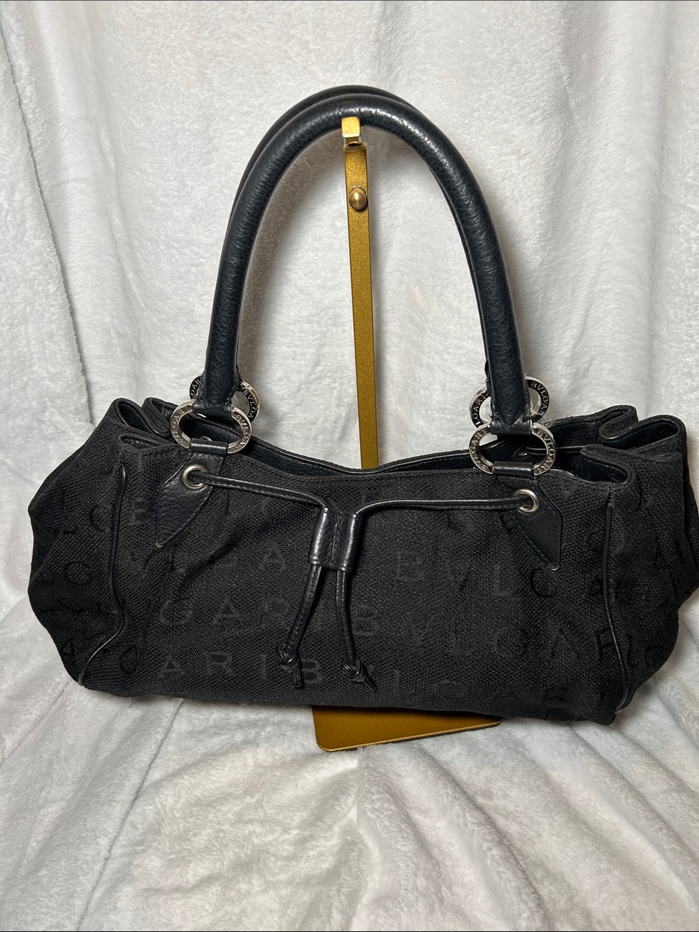 409. Bulgari Logomania canvas and leather drawstring shoulder bag